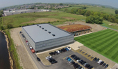 Project: Burnley FC Training Ground. Material: 21 x 140 Thermowood D Mineral Grey Coated. 42 x 42 Grey Batten.