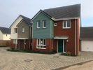 Project: Houses at Roundswell, Barnstaple. Profile: ex 150mm Rebated Bevel. Colours: Taupe and Arboretum Green