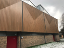 Project: The German School - Richmond. Fire Retardant treated and factory coated Siberian Larch. Grade: Unsorted. Profile: 20f x 120f PAR Eased four edges.