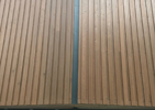 Project: The German School - Richmond. Fire Retardant treated and factory coated Siberian Larch. Grade: Unsorted. Profile: 20f x 120f PAR Eased four edges.