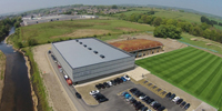 Project: Burnley FC Training Ground. Material: 21 x 140 Thermowood D Mineral Grey Coated. 42 x 42 Grey Batten.